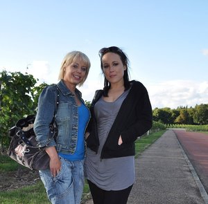 Hot Latina girl Polliana lets a nipple slip attired in sexy pantyhose